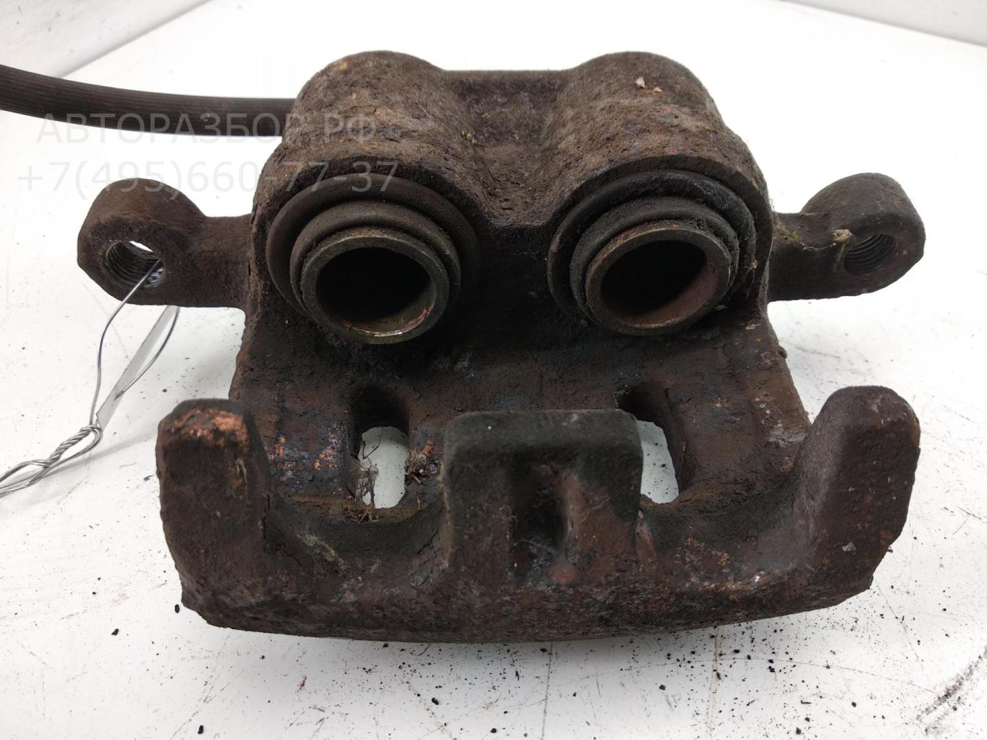 Суппорт передний левый