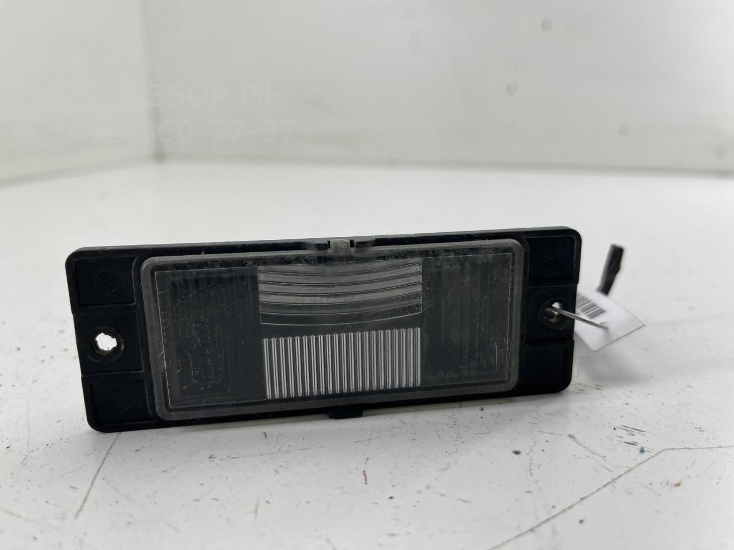 Фонарь подсветки номера