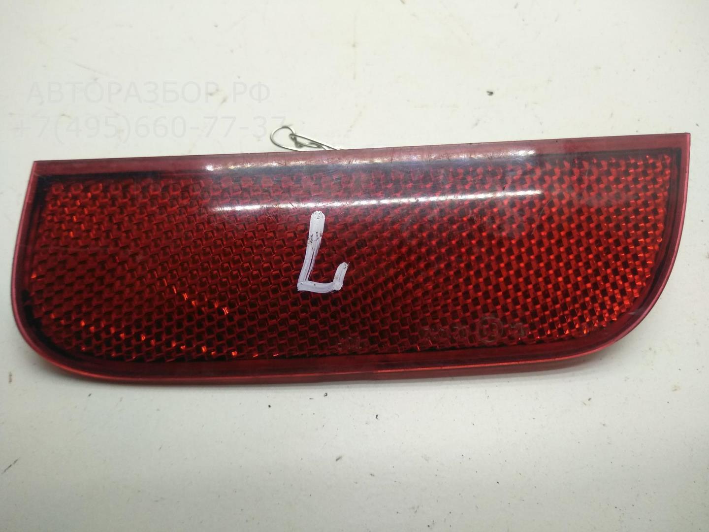 Отражатель в бампер задний левый