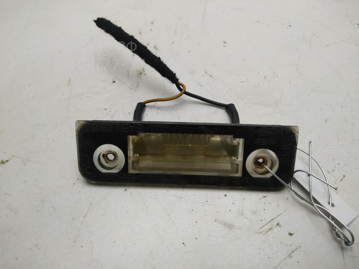 Фонарь подсветки номера