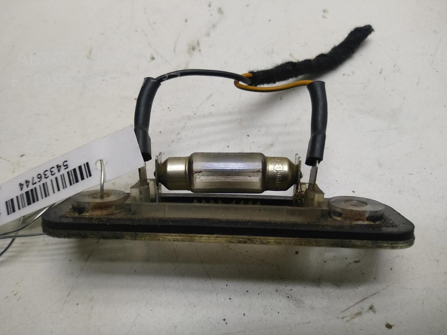 Фонарь подсветки номера