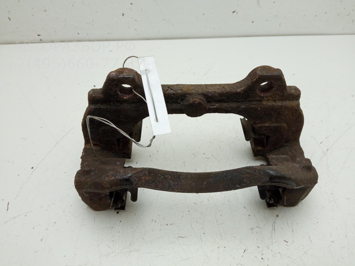 Скоба суппорта переднего