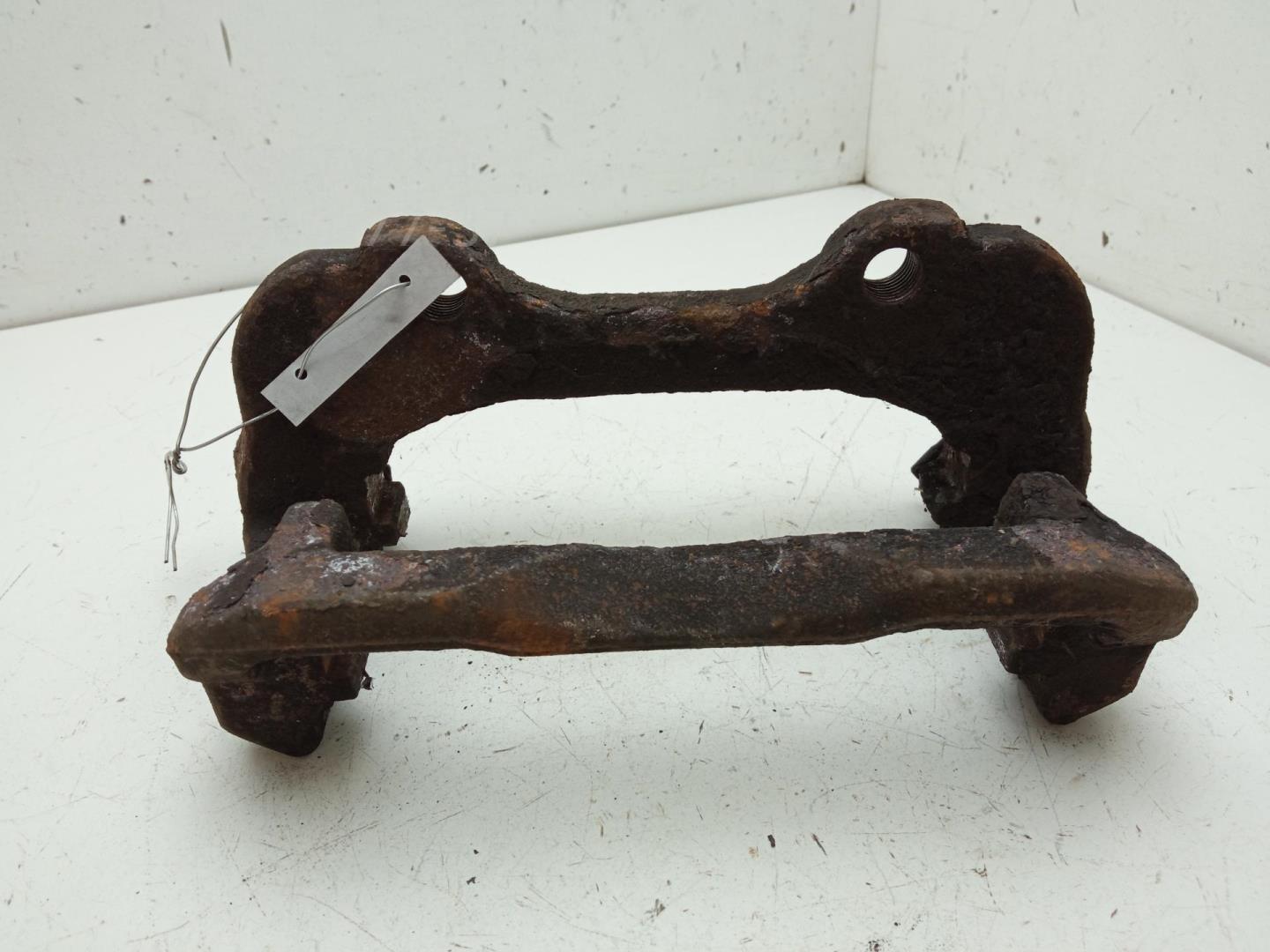 Скоба суппорта переднего