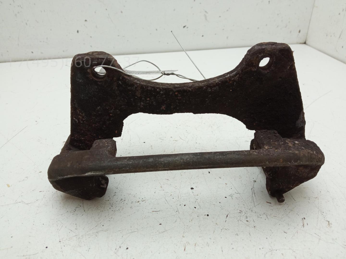 Скоба суппорта переднего