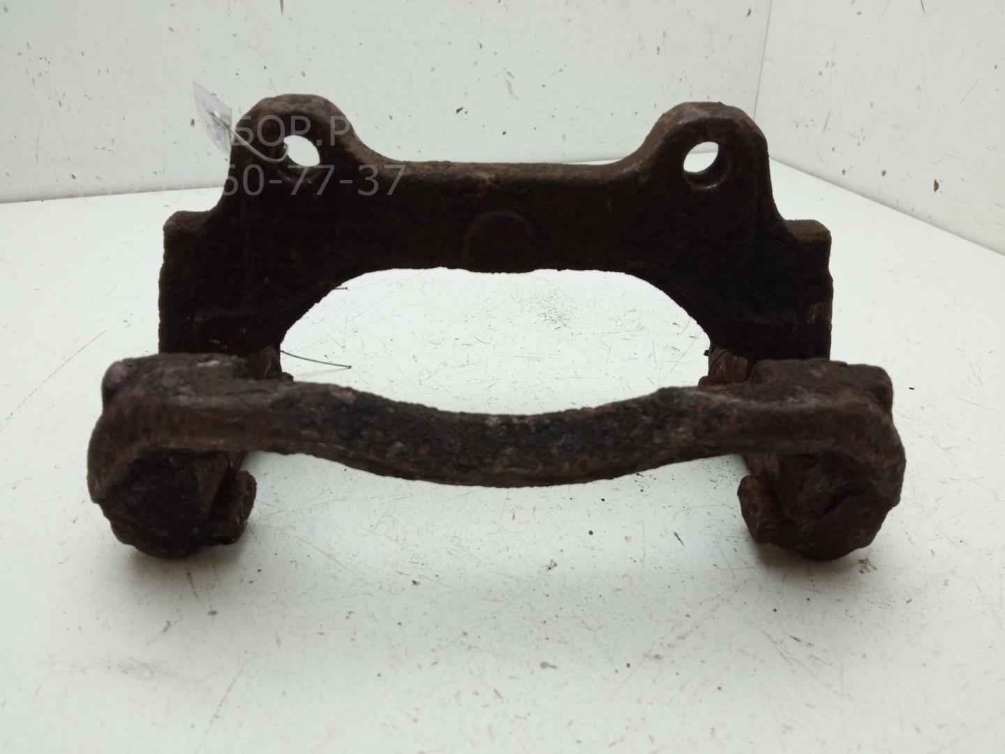 Скоба суппорта переднего