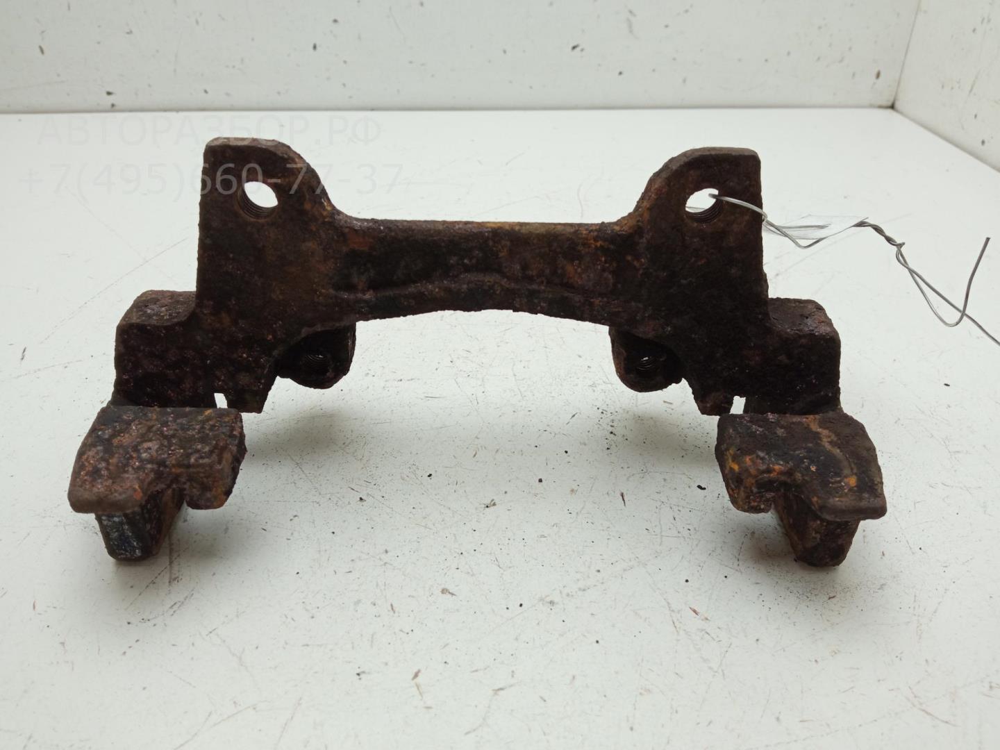 Скоба суппорта переднего