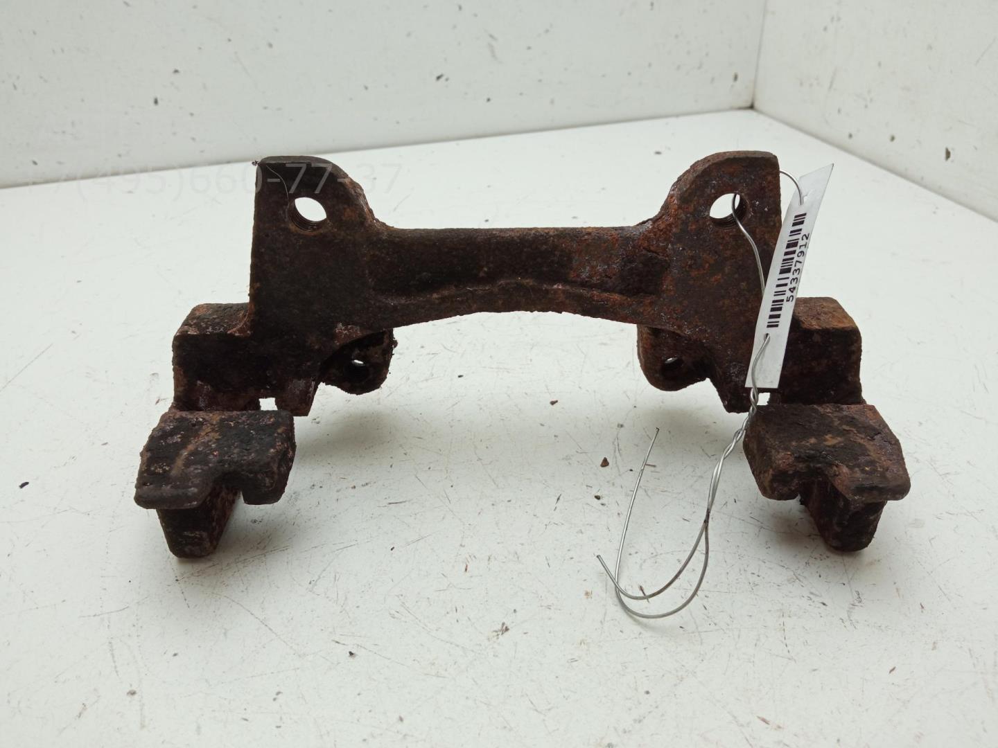 Скоба суппорта переднего