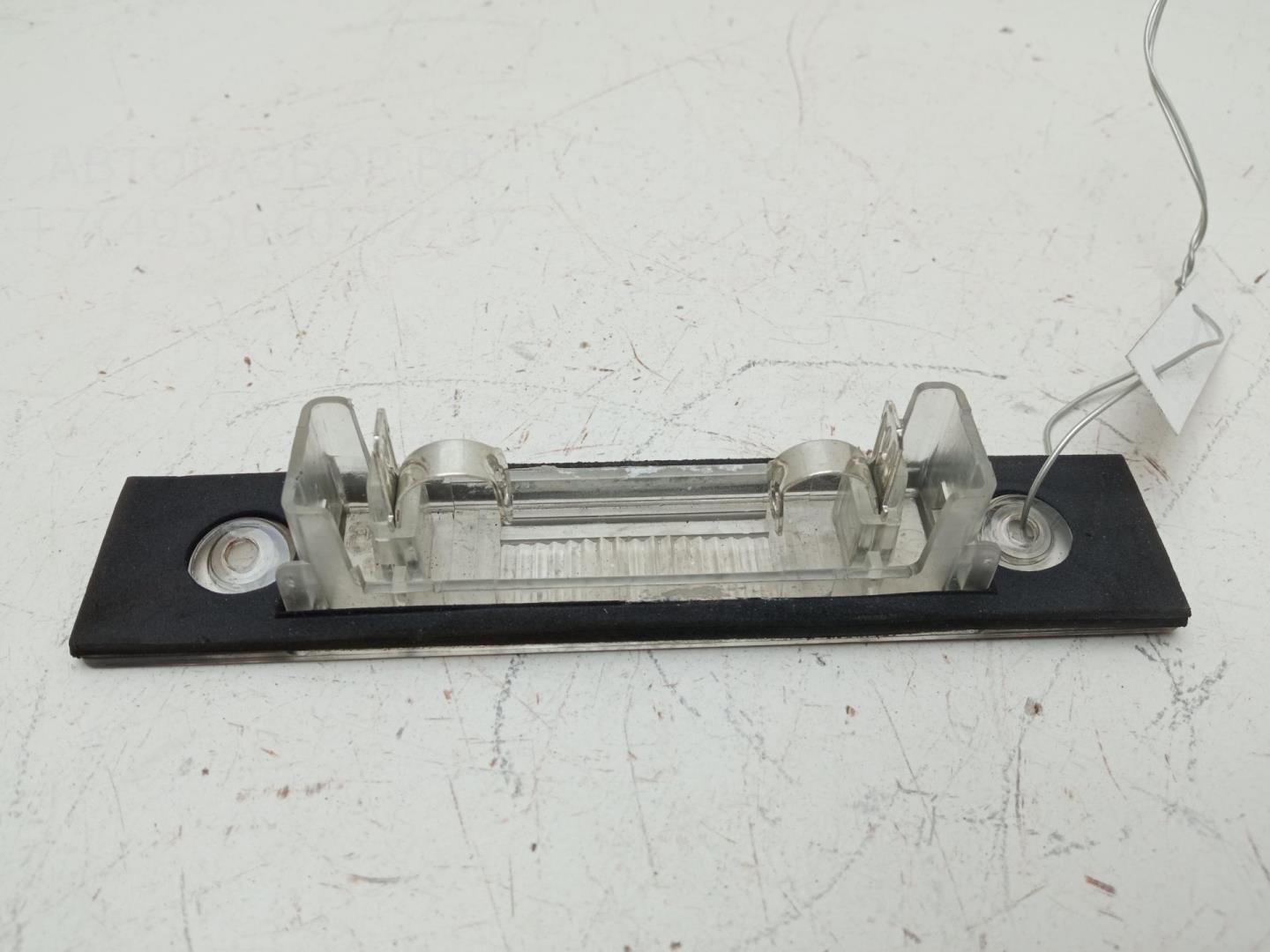 Фонарь подсветки номера