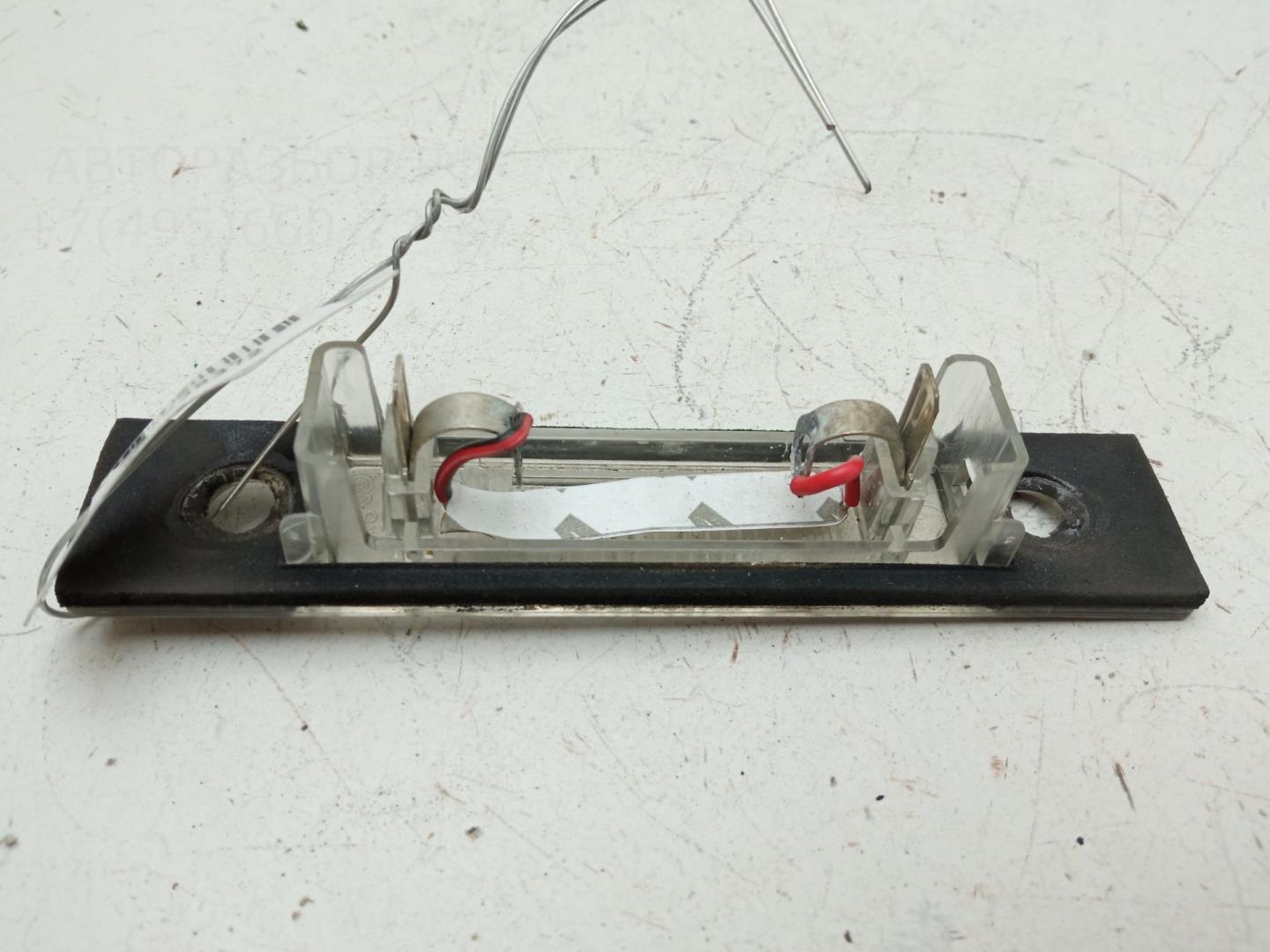 Фонарь подсветки номера