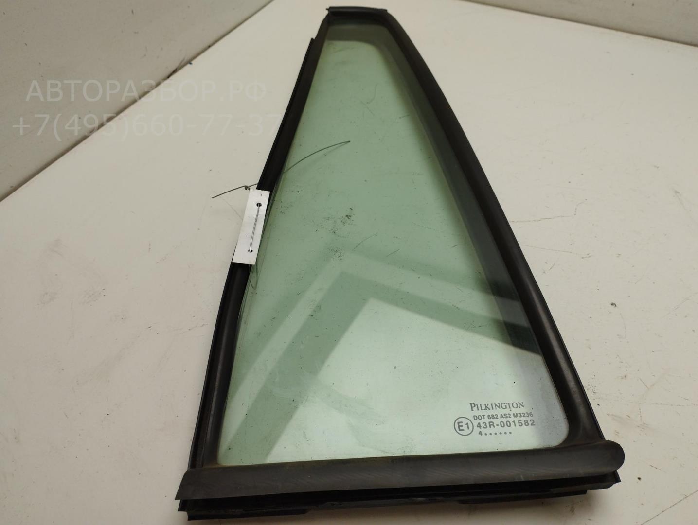 Стекло двери задней левой (форточка)