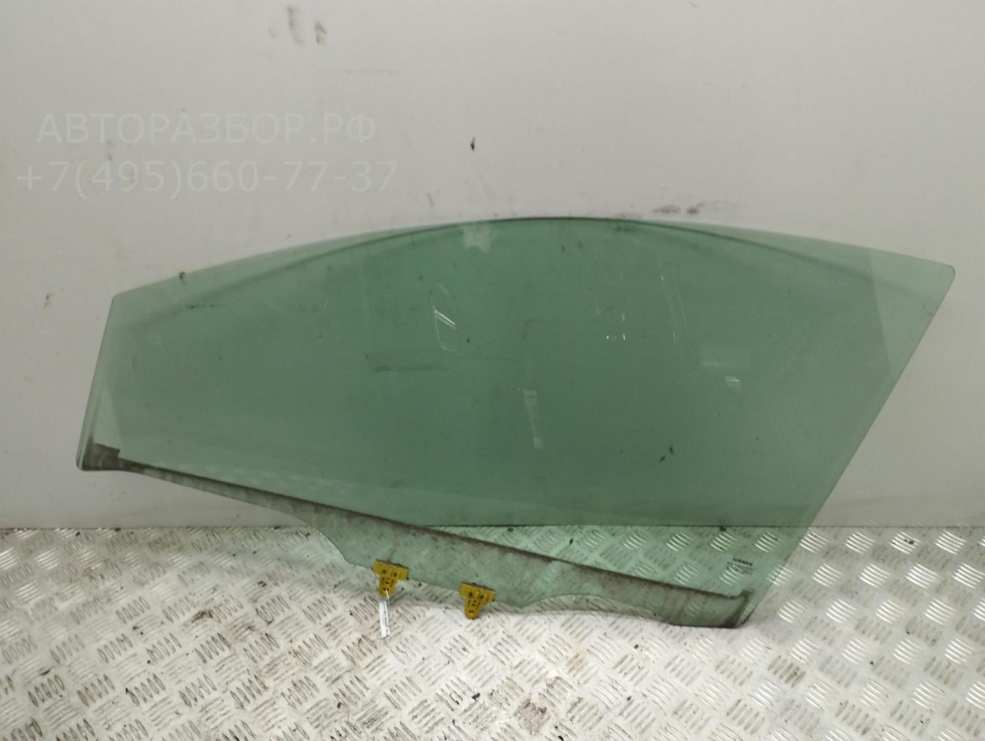 Стекло двери передней левой