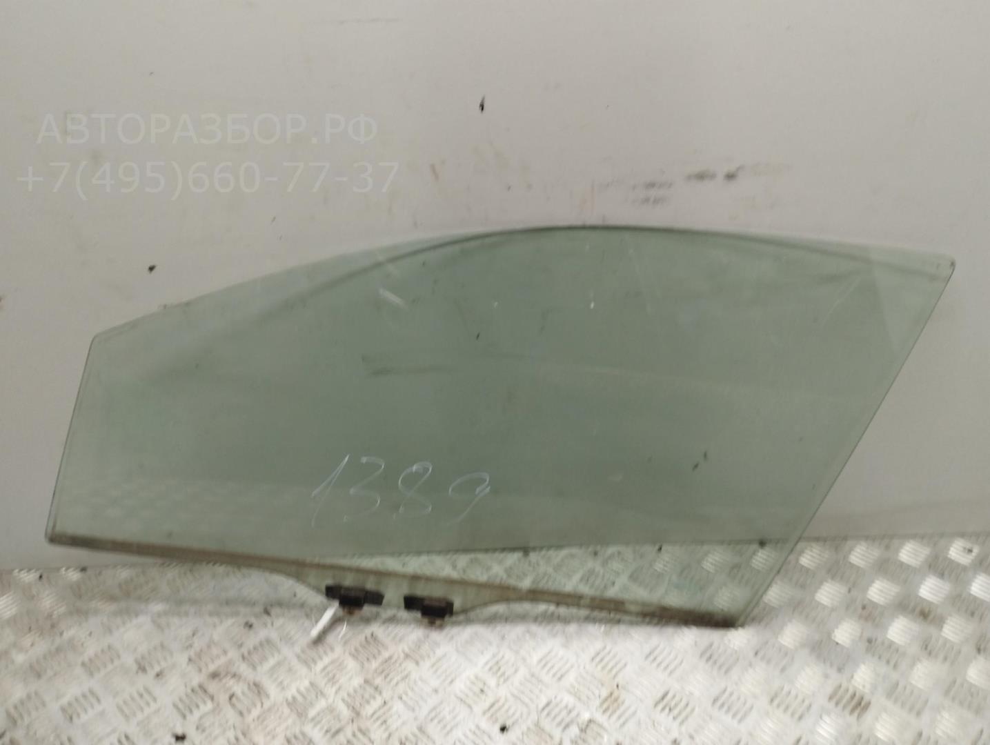 Стекло двери передней левой
