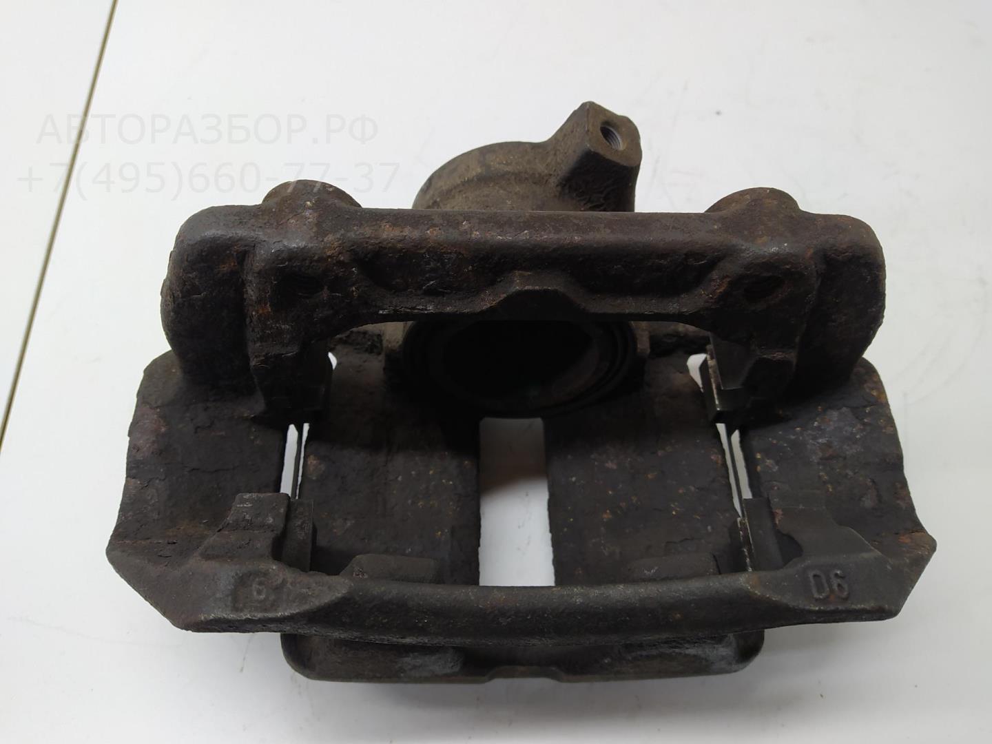 Суппорт передний левый