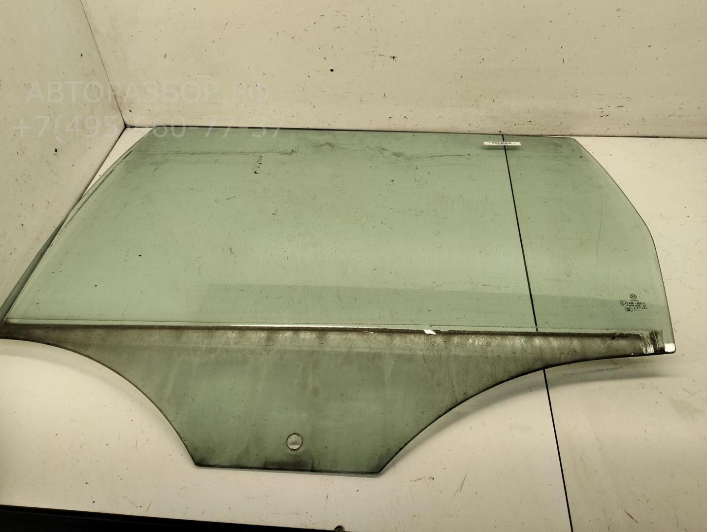 Стекло двери задней левой
