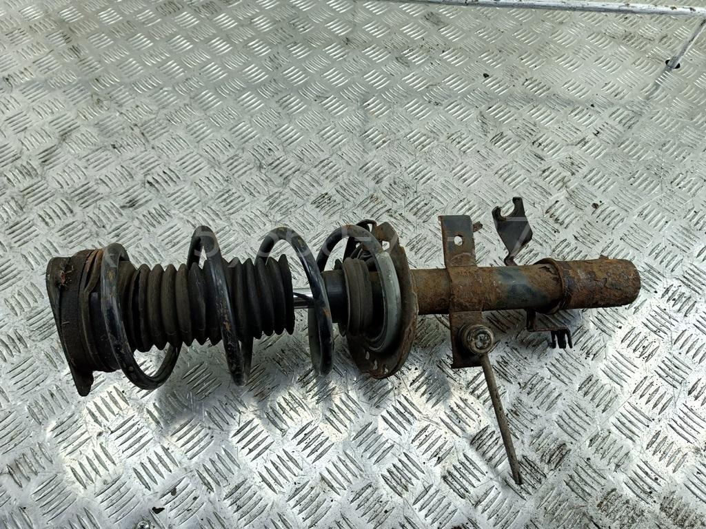 Амортизатор передний левый