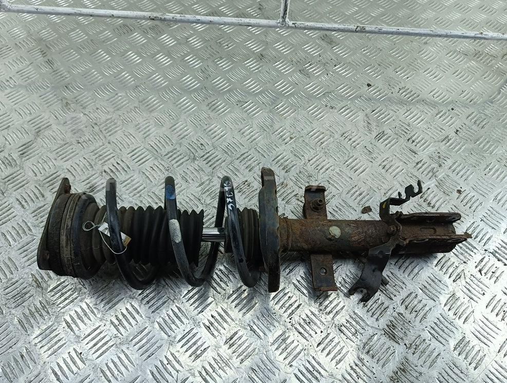 Амортизатор передний левый