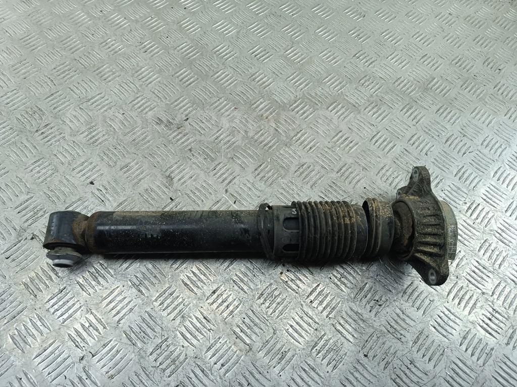 Амортизатор задний левый