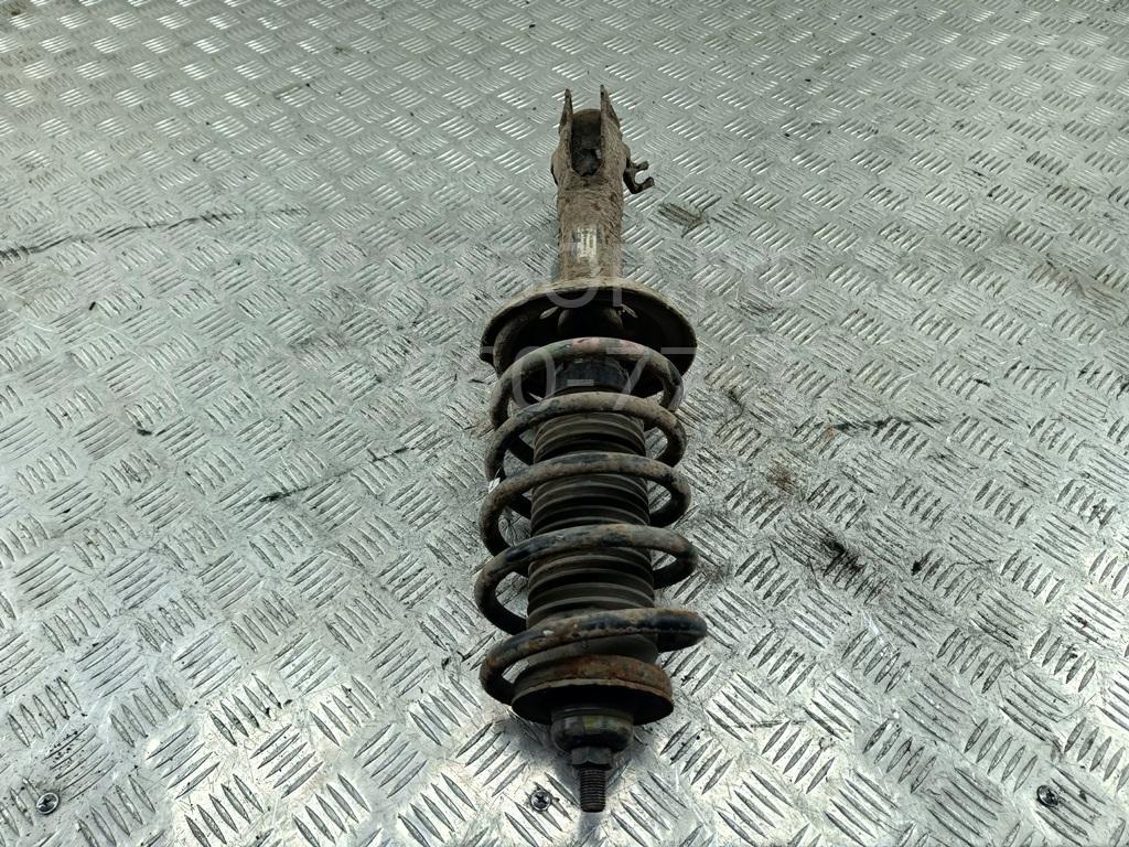 Амортизатор передний левый