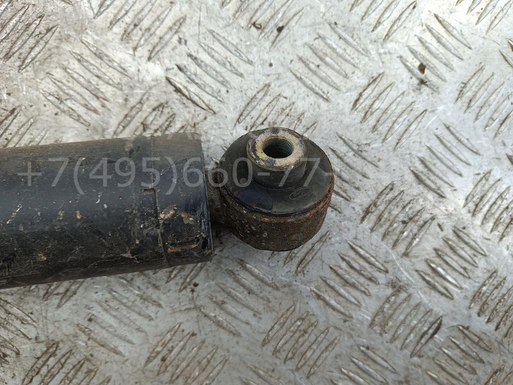 Амортизатор задний левый