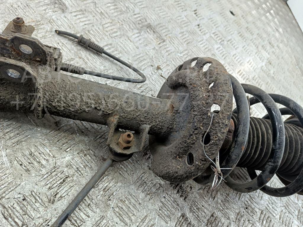 Амортизатор передний левый