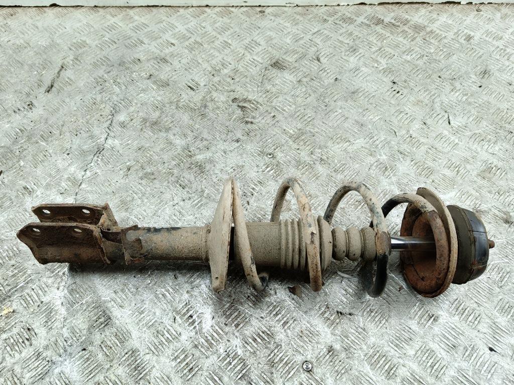 Амортизатор передний левый