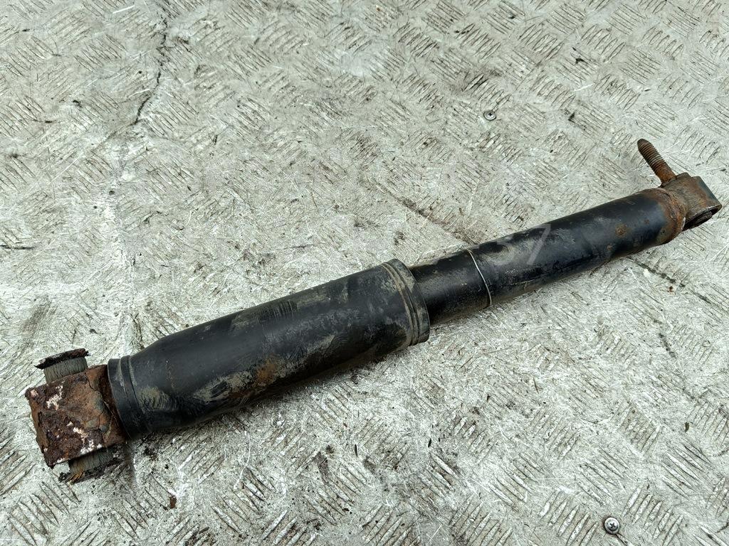 Амортизатор задний левый