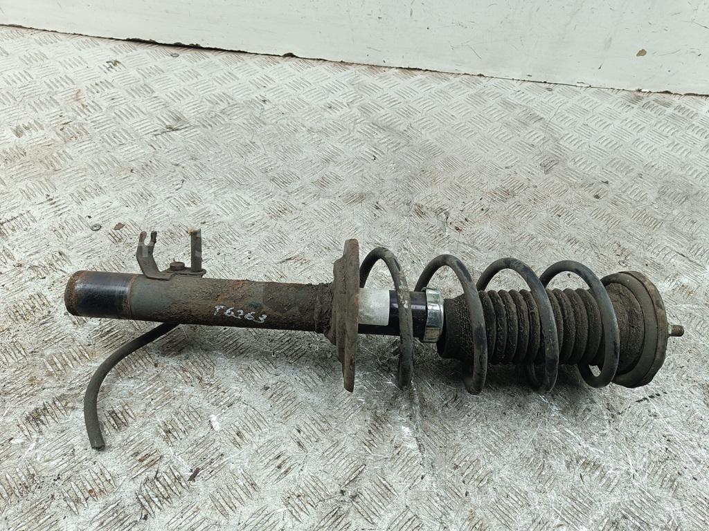 Амортизатор передний левый