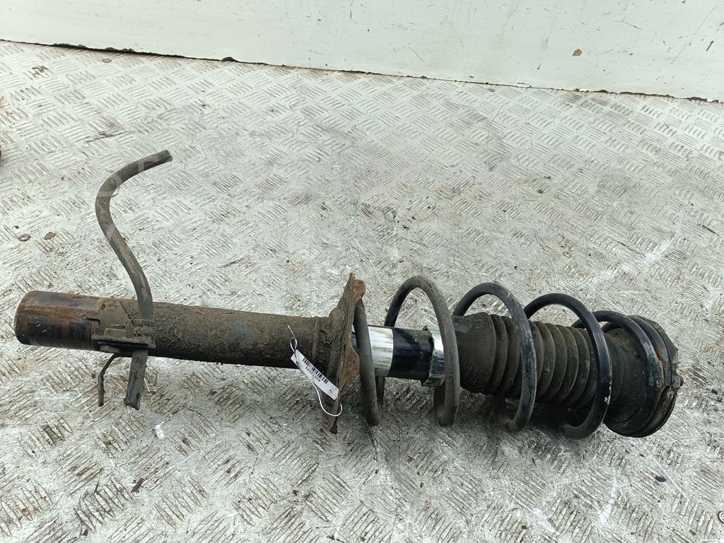 Амортизатор передний левый