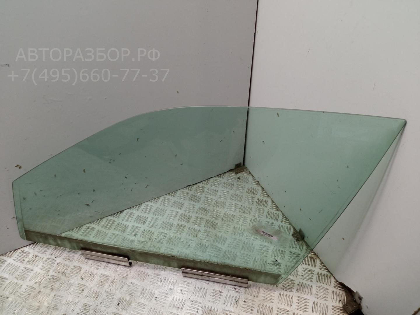 Стекло двери передней левой