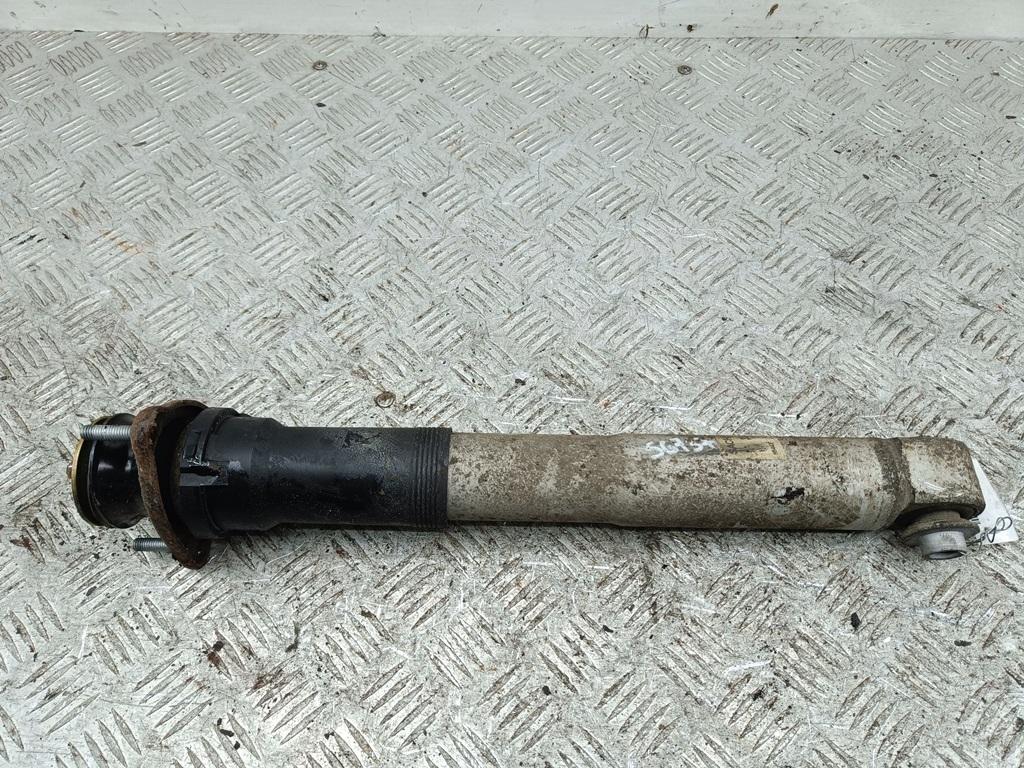 Амортизатор задний левый