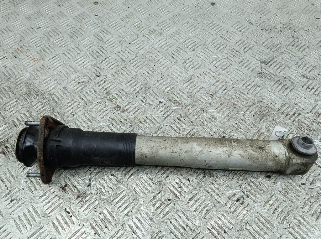 Амортизатор задний левый