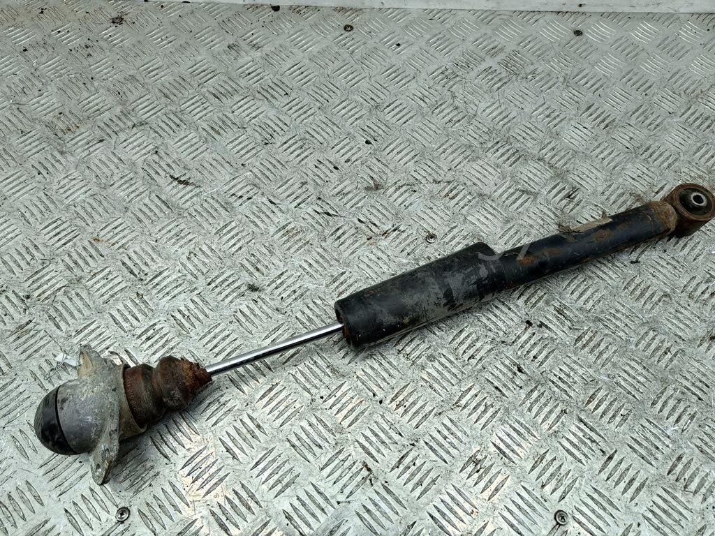 Амортизатор задний левый