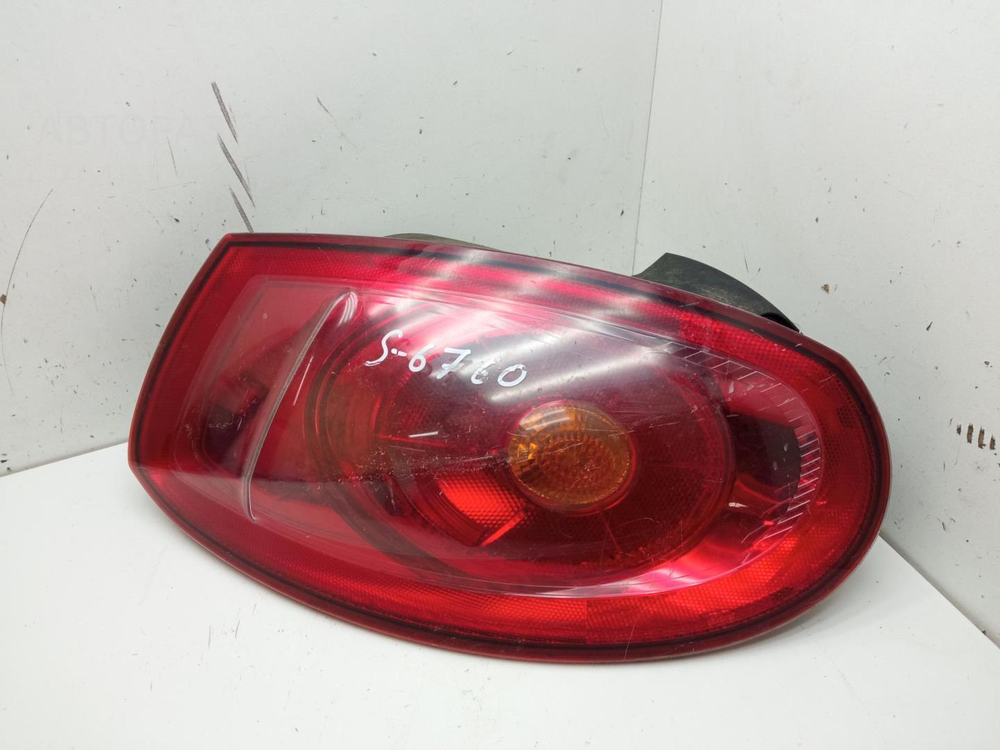 Фонарь задний левый