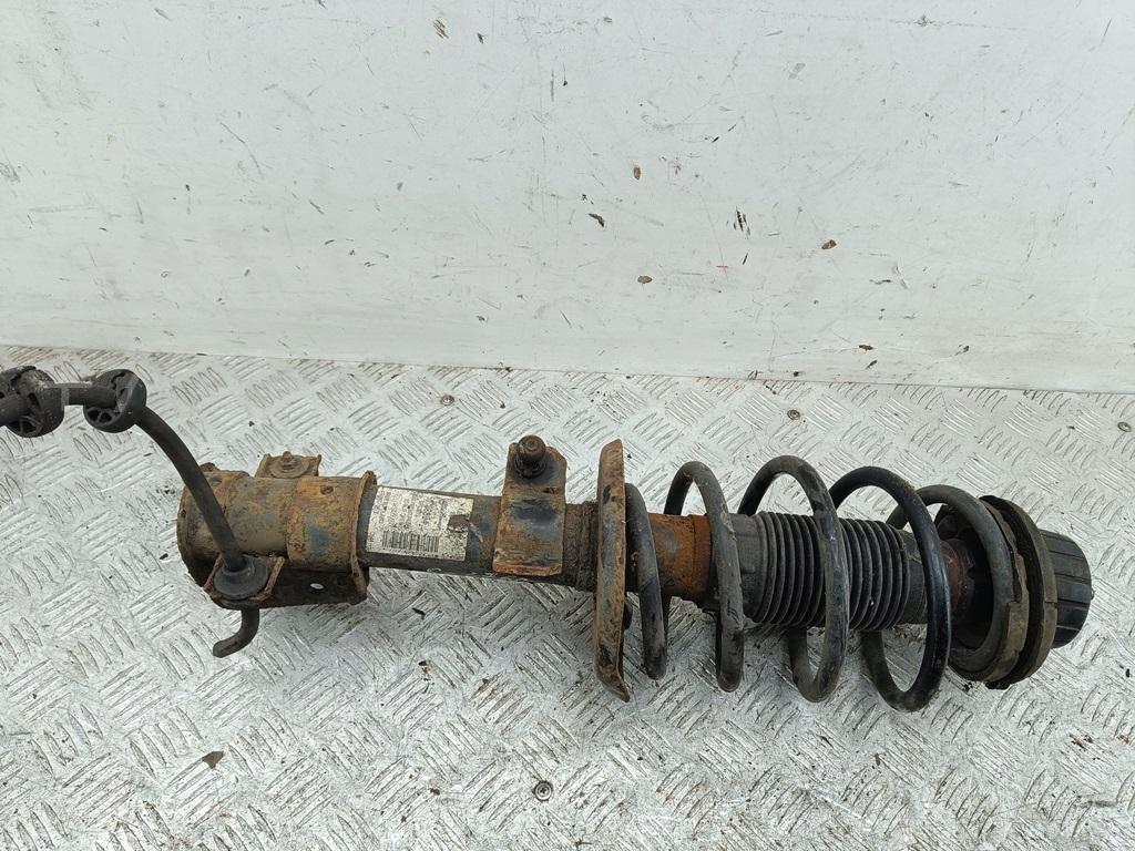 Амортизатор передний левый