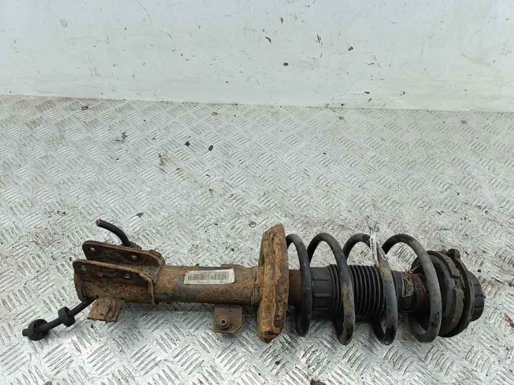 Амортизатор передний левый