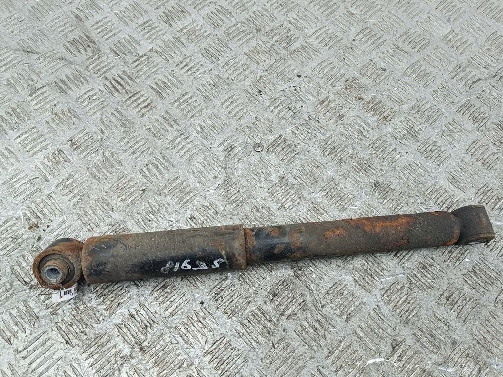 Амортизатор задний левый