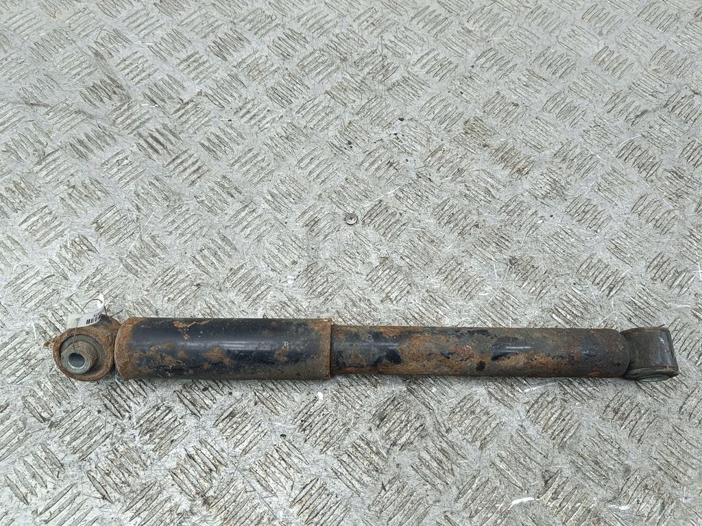 Амортизатор задний левый