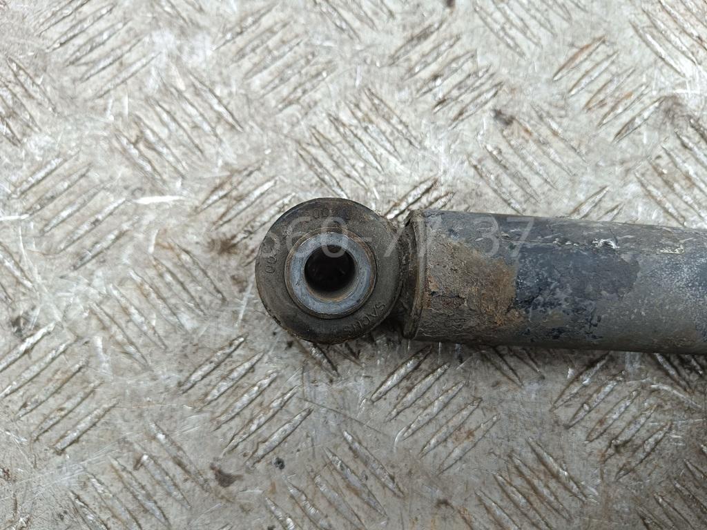 Амортизатор задний левый