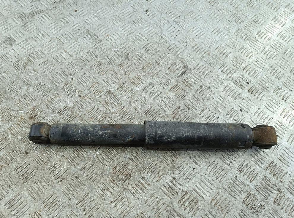 Амортизатор задний левый