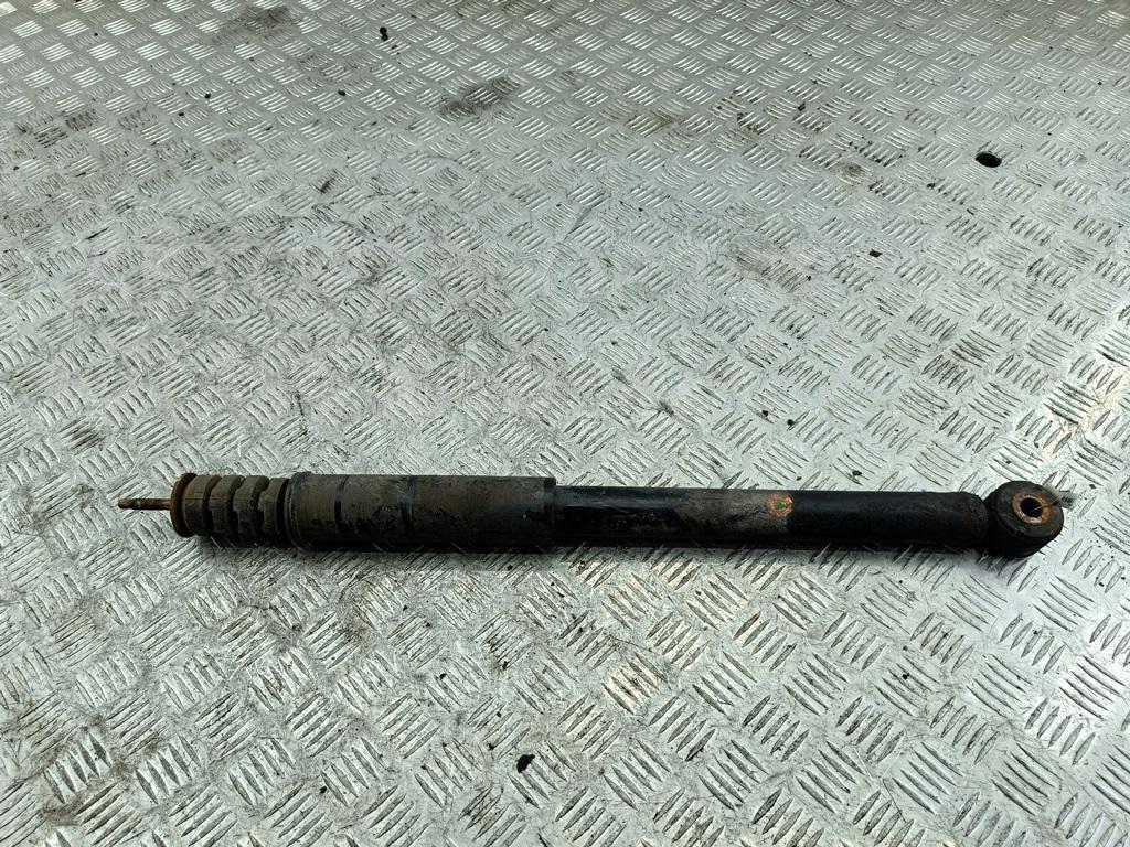 Амортизатор задний левый