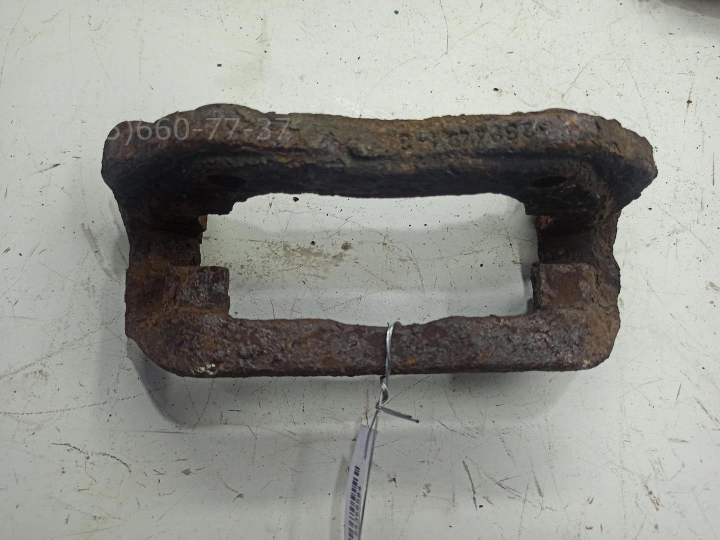 Скоба суппорта переднего