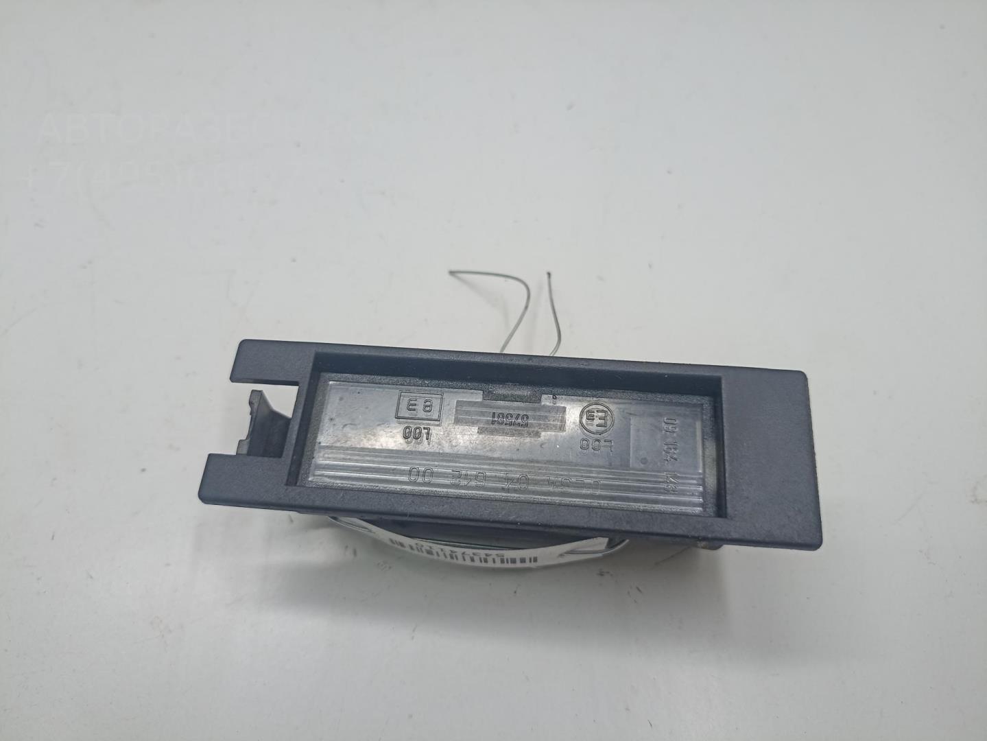 Фонарь подсветки номера