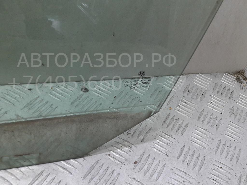 Стекло двери передней левой