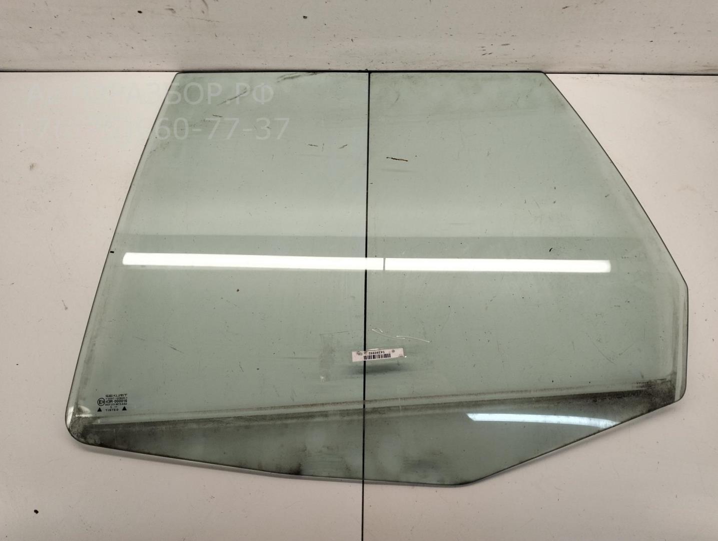 Стекло двери задней левой