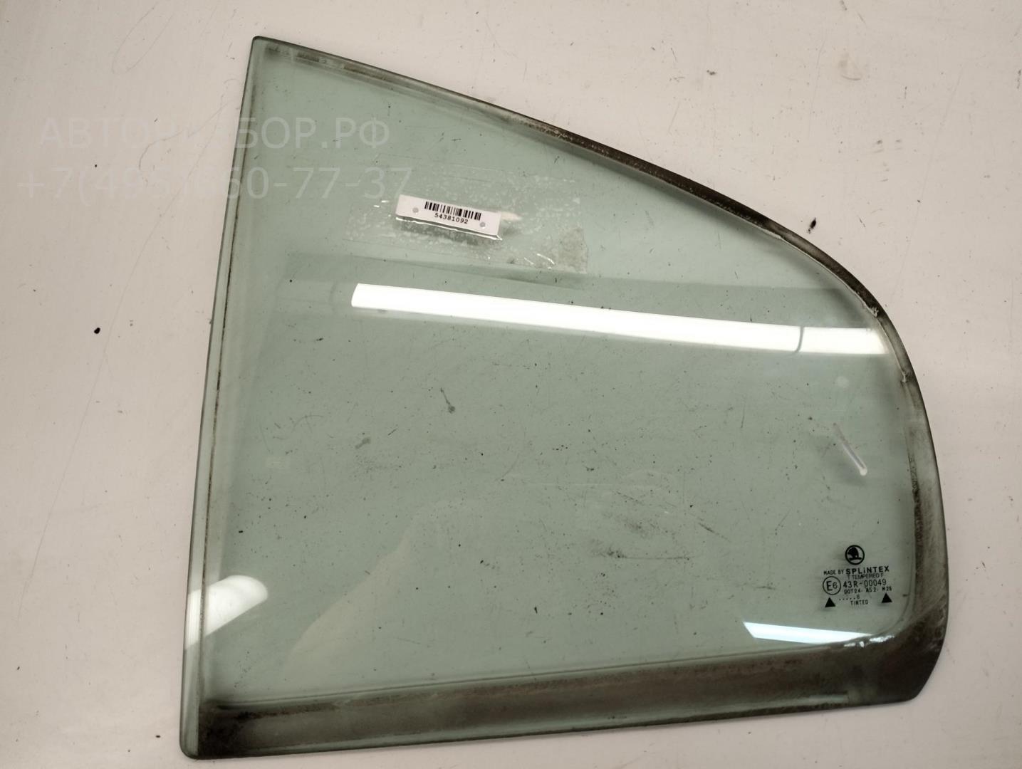 Стекло двери задней левой (форточка)