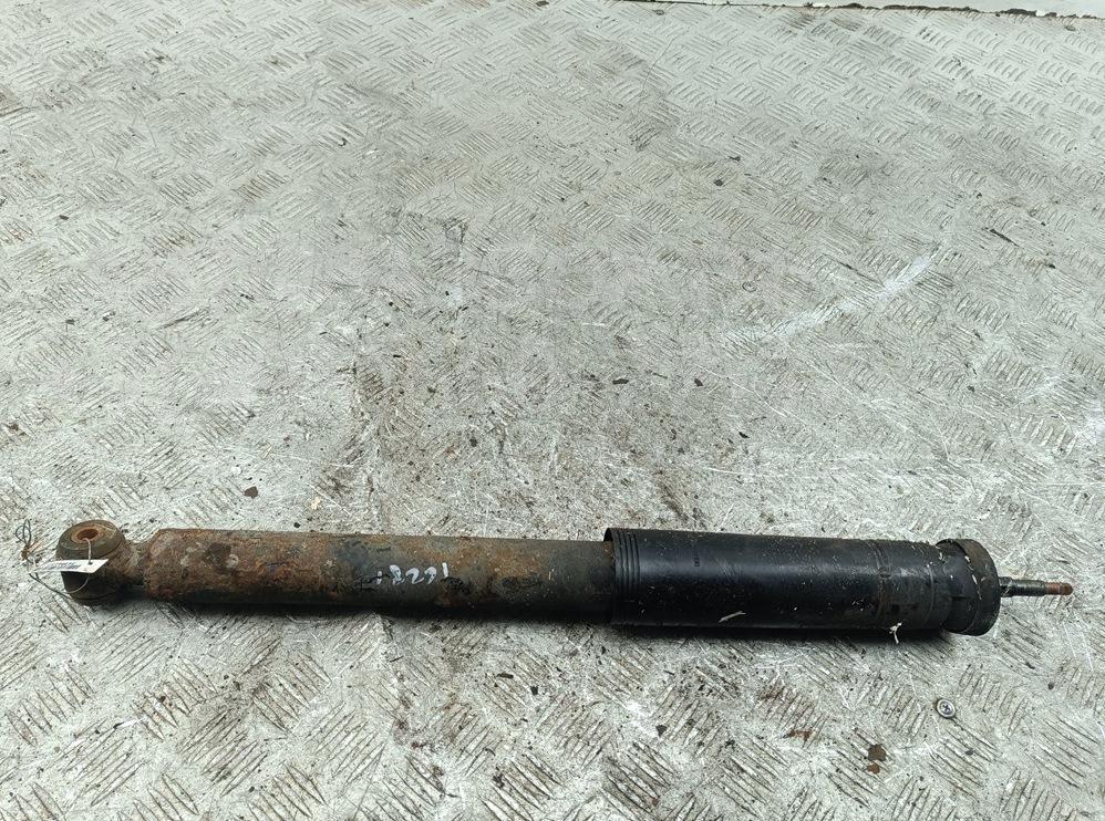 Амортизатор задний левый