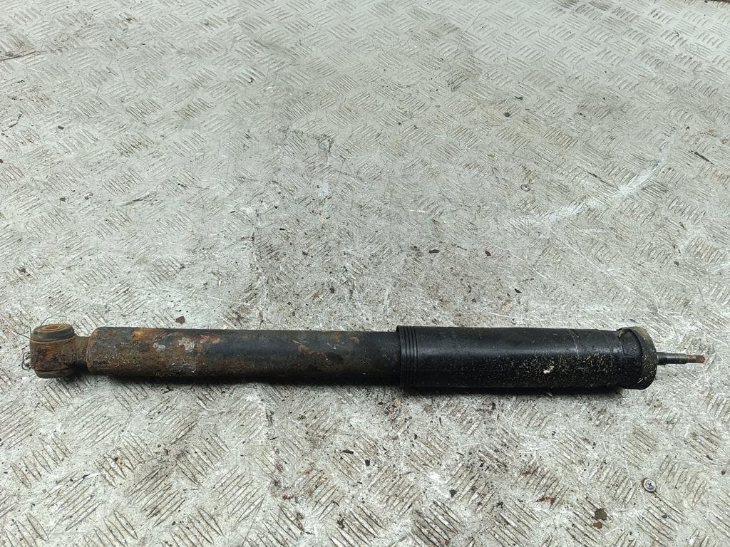 Амортизатор задний левый