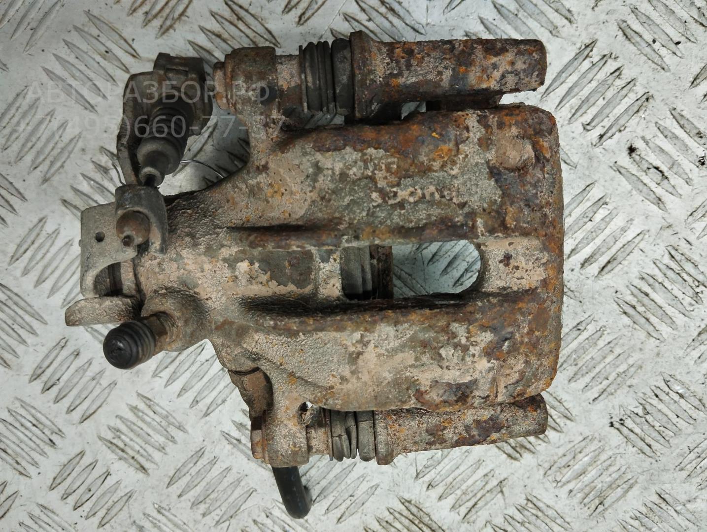 Суппорт задний левый