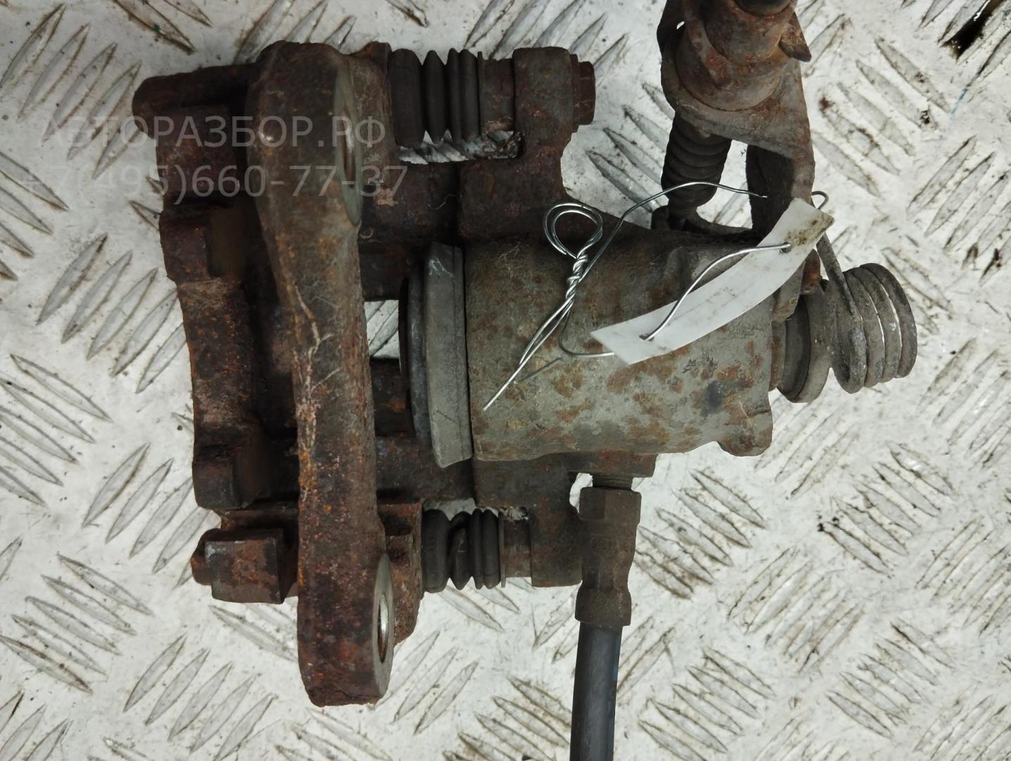 Суппорт задний левый