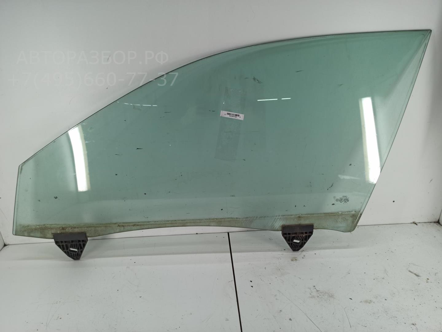 Стекло двери передней левой